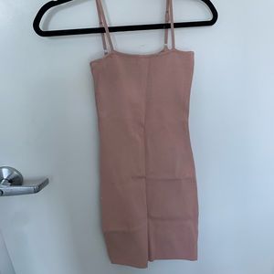 nude body con dress with a stretchy material